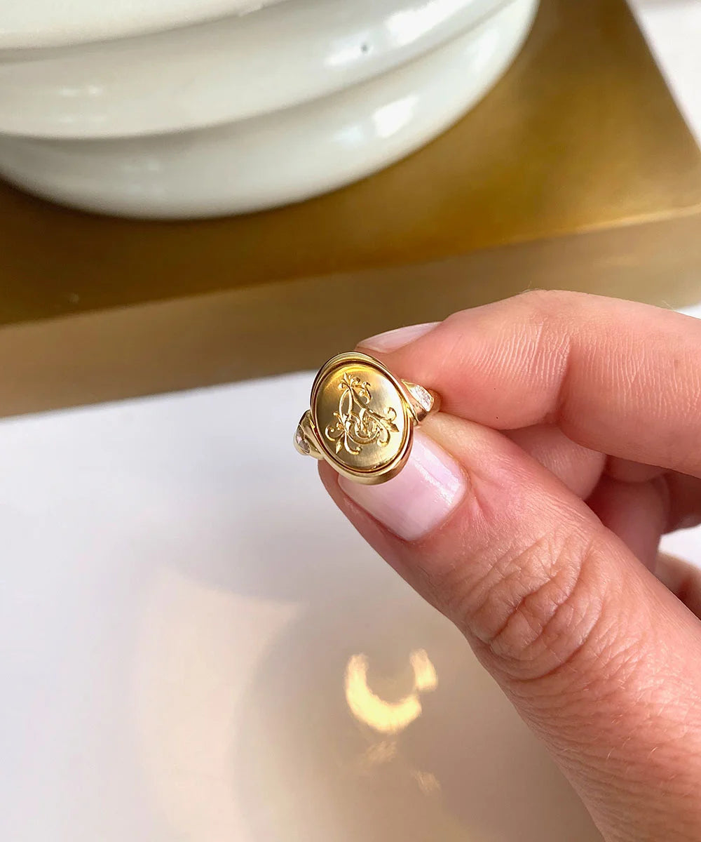 Oval Ribbon Signet Ring with Heart Diamonds